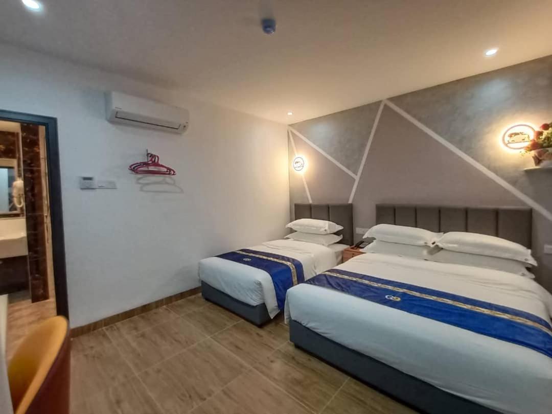 Good 9 Hotel - Cahaya Kota Puteri Пасир-Гуданг Экстерьер фото