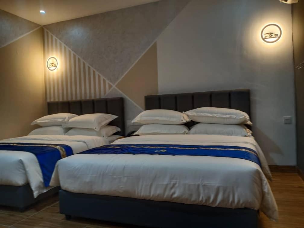 Good 9 Hotel - Cahaya Kota Puteri Пасир-Гуданг Экстерьер фото