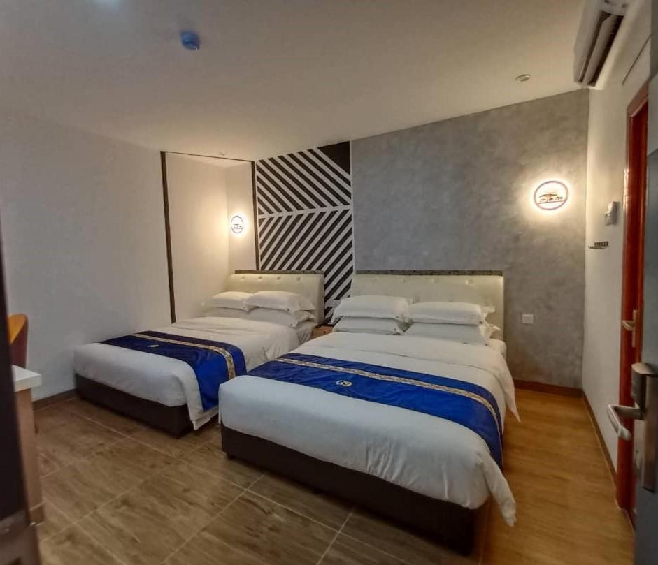 Good 9 Hotel - Cahaya Kota Puteri Пасир-Гуданг Экстерьер фото